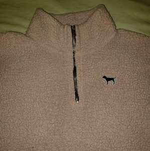 Pink quarter zip sherpa sweater.